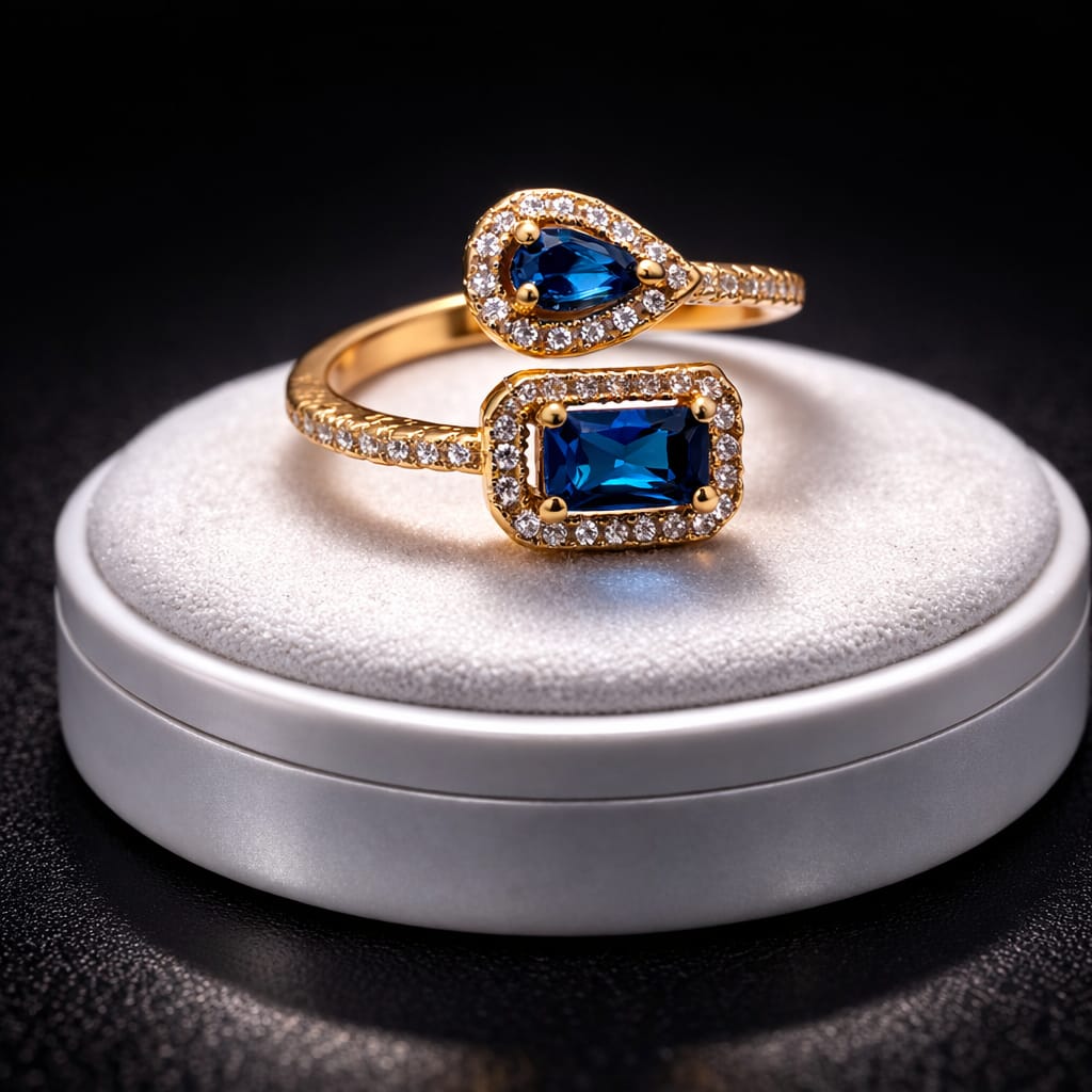 A luxurious ring with two blue stones, gold-plated 21