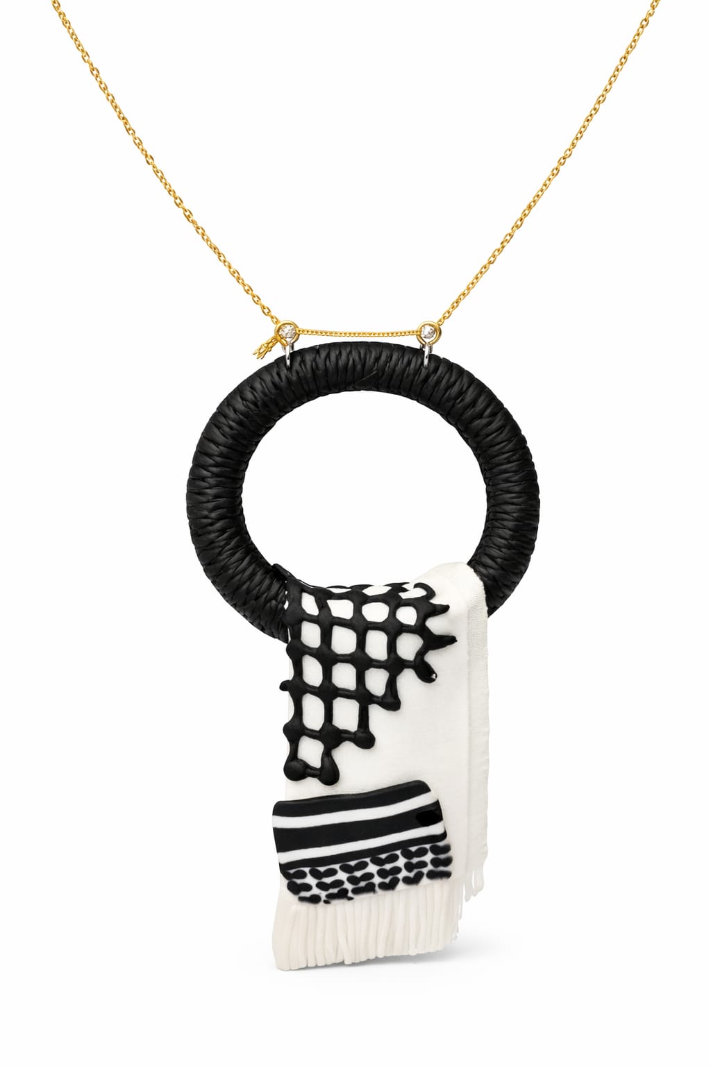 A traditional pendant inspired by the Palestinian keffiyeh.