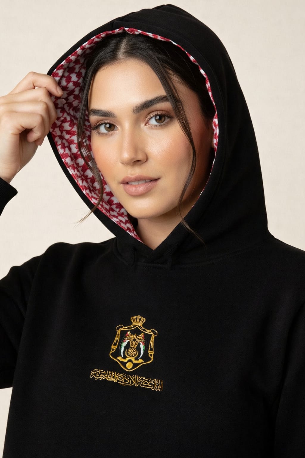Black hoodie with gold embroidery and Jordanian keffiyeh lining
