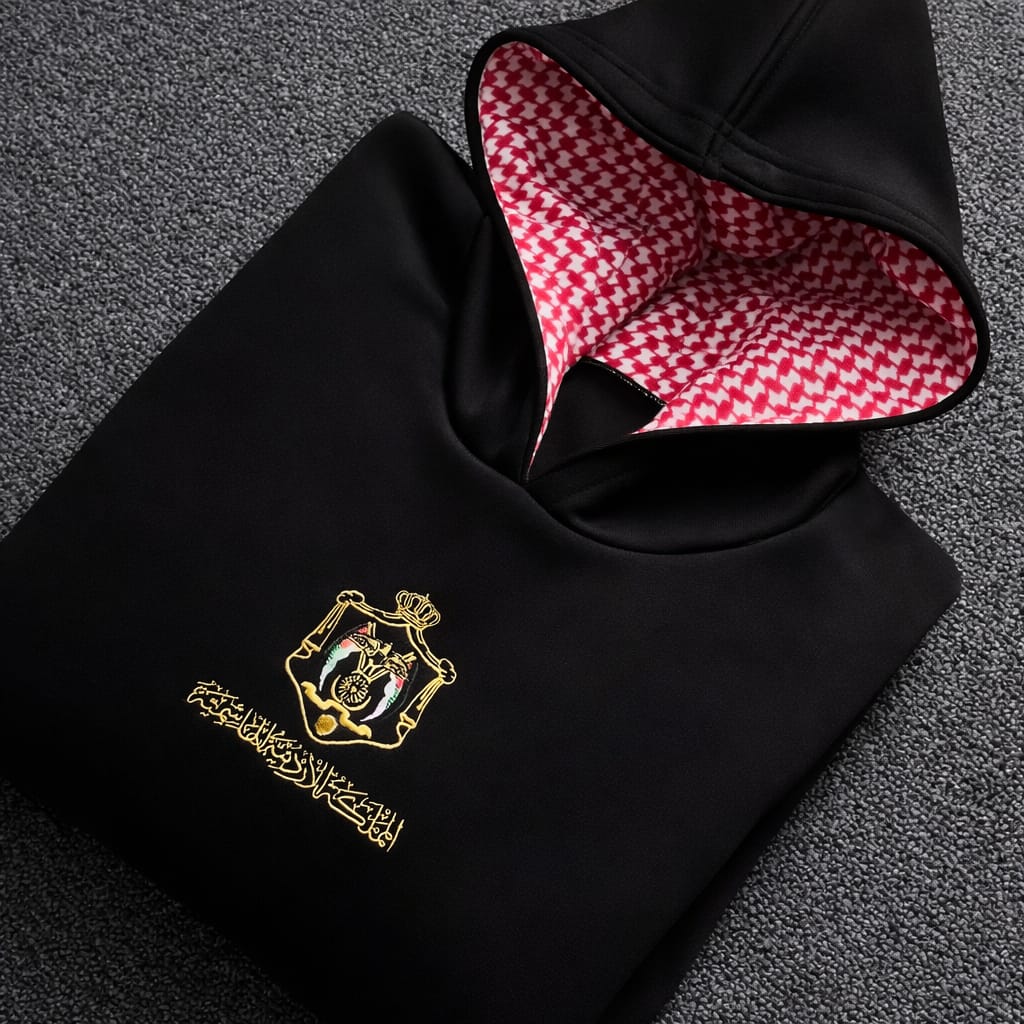 Black hoodie with gold embroidery and Jordanian keffiyeh lining