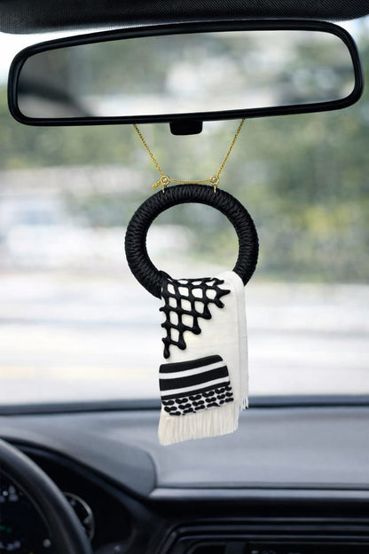 A traditional pendant inspired by the Palestinian keffiyeh.