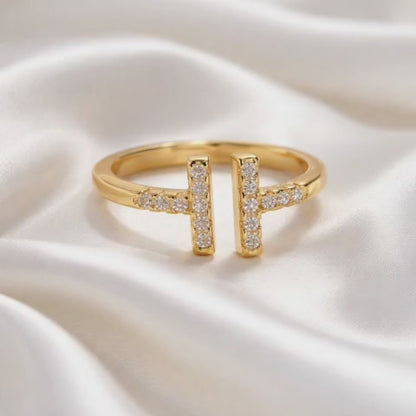 21k gold plated ring with a modern T design, studded with sparkling stones